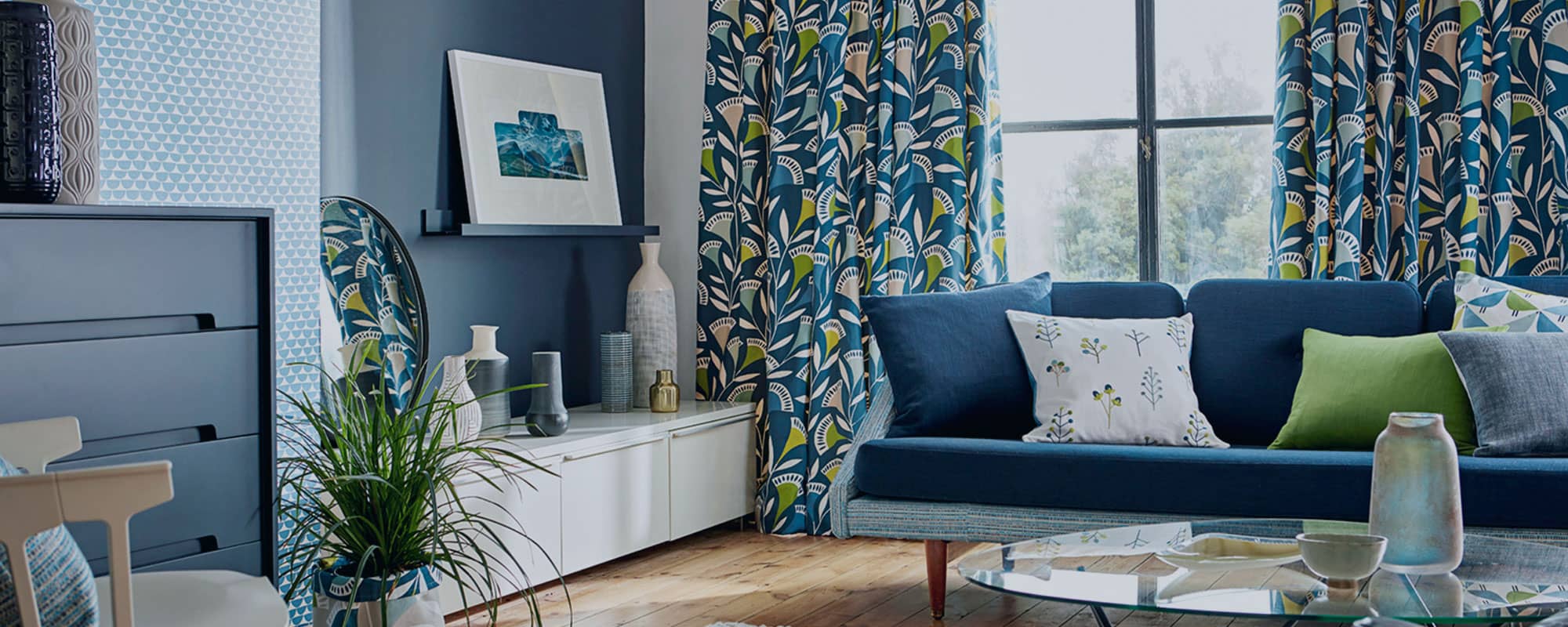 Modern blue curtains and sofa at Shrewsbury house